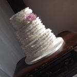 White ruffle wedding cake