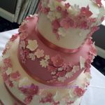 Dusky rose floral wedding cake