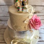 Two tier wedding cake with Lego topper Lancashire