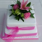 pink fresh flowers wedding cake Lytham St Annes, Lancashire